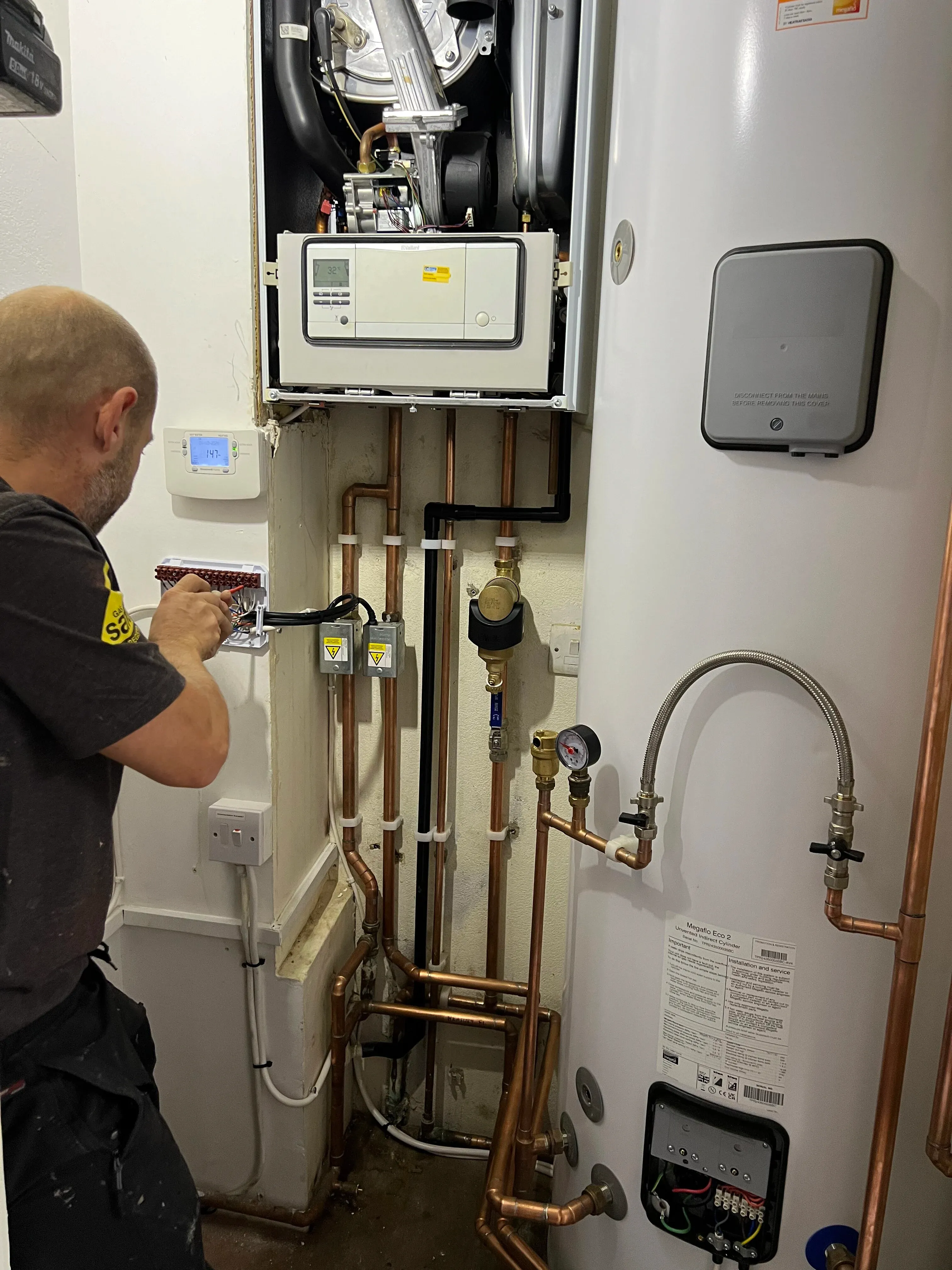 Gas Safe engineer diagnosing a boiler fault in Hornchurch