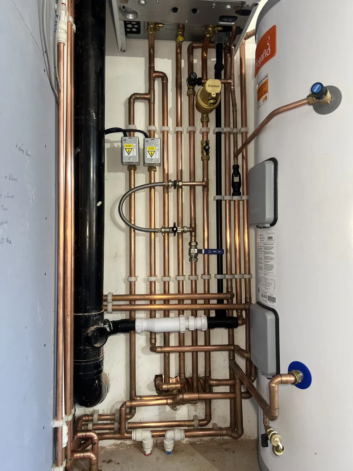 Boiler, hot-water cylinder and copper pipework installation in Harold Wood