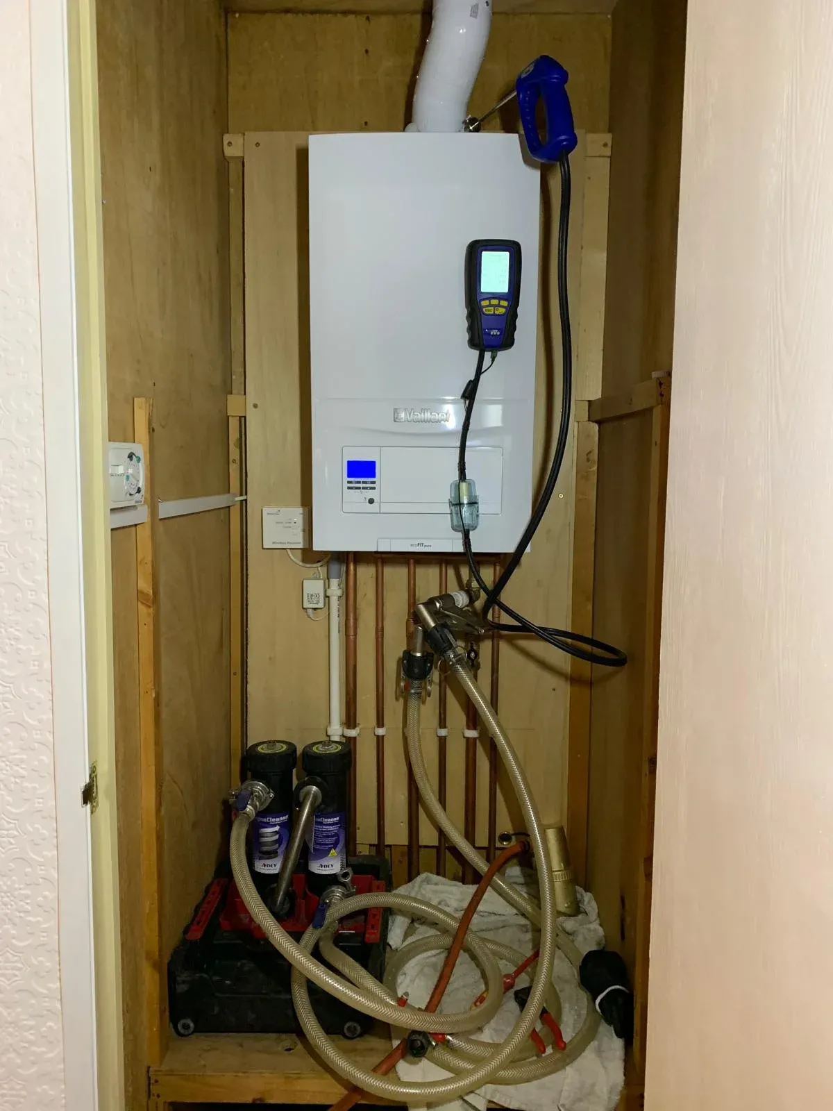 MagnaCleanse equipment connected to a boiler during heating system cleaning